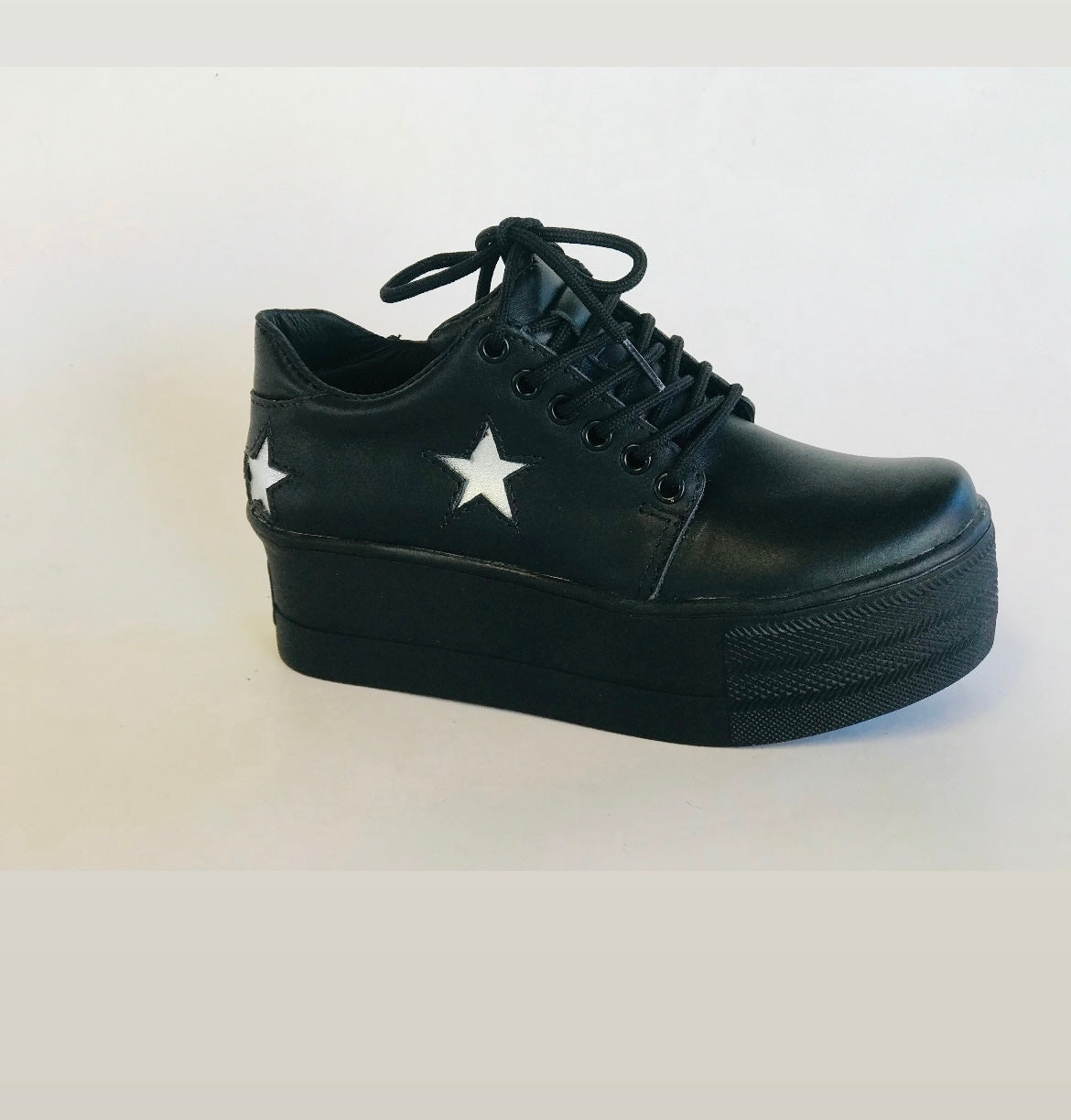 Zapatilla de cuero negro silver star